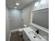 Updated bathroom, featuring a walk-in shower at 3225 Cricketeer Dr, Charlotte, NC 28216