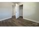 Bedroom with hardwood floors and a closet at 3225 Cricketeer Dr, Charlotte, NC 28216