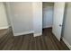 Bedroom with wood-look floors and a closet at 3225 Cricketeer Dr, Charlotte, NC 28216