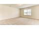 Bright bedroom with carpeted floor and large window at 4010 Cedar Falls Dr # 23, Waxhaw, NC 28173