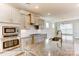 Modern kitchen with stainless steel appliances and granite countertops at 4010 Cedar Falls Dr # 23, Waxhaw, NC 28173