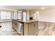Island kitchen with granite countertops and stainless steel appliances at 4010 Cedar Falls Dr # 23, Waxhaw, NC 28173