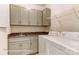 Laundry room with washer, dryer, cabinets, and sink at 4010 Cedar Falls Dr # 23, Waxhaw, NC 28173