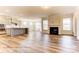 Open living space with hardwood floors and fireplace at 4010 Cedar Falls Dr # 23, Waxhaw, NC 28173