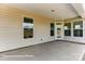 Covered patio with access to backyard at 4010 Cedar Falls Dr # 23, Waxhaw, NC 28173