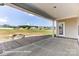 Covered patio overlooking backyard at 4010 Cedar Falls Dr # 23, Waxhaw, NC 28173