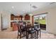 Kitchen with dining area and sliding glass doors to backyard at 6107 Follow The Trl, Indian Trail, NC 28079