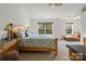 Main bedroom with king-size bed and large windows at 6107 Follow The Trl, Indian Trail, NC 28079