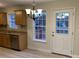 Kitchen dining area with access to backyard deck at 623 Faith St, Oakboro, NC 28129