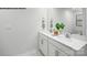 Double vanity bathroom with white cabinets and hexagonal tile at 717 Wagon Cross Ct, York, SC 29745