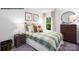 bedroom with plaid bedding, dinosaur decor, and ample closet space at 717 Wagon Cross Ct, York, SC 29745