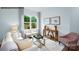 Cozy living room features a comfy sofa and a console table at 717 Wagon Cross Ct, York, SC 29745
