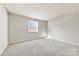 Bedroom with carpet flooring and a window at 7992 Shady Oak Trl, Charlotte, NC 28210