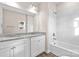 Bathroom with granite countertops, double vanity and tub at 801 S Long St, Salisbury, NC 28144