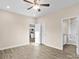 Bedroom with access to bathroom and ceiling fan at 801 S Long St, Salisbury, NC 28144