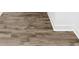 Modern grey wood-look vinyl plank flooring at 801 S Long St, Salisbury, NC 28144