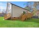 House exterior with two wooden decks and grassy yard at 801 S Long St, Salisbury, NC 28144