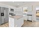 Modern kitchen with stainless steel appliances and granite island at 801 S Long St, Salisbury, NC 28144