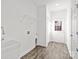 Laundry room with utility sink, shelving and exterior access at 801 S Long St, Salisbury, NC 28144