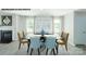 Dining room with fireplace and large windows at 1018 Hostler Ln, York, SC 29745