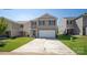 Two-story house with attached garage and landscaping at 1018 Hostler Ln, York, SC 29745