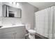 Clean bathroom with gray vanity and shower/tub at 11015 Vista Haven Dr, Charlotte, NC 28226
