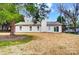 Back of house, featuring a sliding glass door and chimney at 11015 Vista Haven Dr, Charlotte, NC 28226
