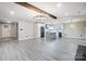 Open living area with kitchen and gray flooring at 11015 Vista Haven Dr, Charlotte, NC 28226