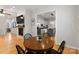 Charming dining area with a round wooden table and four chairs at 126 Liberty St, Mooresville, NC 28115