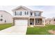 Two-story house with stone accents and a two-car garage at 130 Paige Rd # 12, Kings Mountain, NC 28086