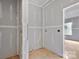 Unfinished bathroom features open doorway and roughed-in plumbing at 143 Tranquility Ln, Harmony, NC 28634