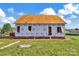 New construction home with a brick foundation, ready for its finishing touches on a spacious lot at 143 Tranquility Ln, Harmony, NC 28634