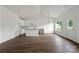 Bright, white kitchen with an island and stainless steel appliances at 143 Tranquility Ln, Harmony, NC 28634