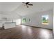 Open living space featuring a kitchen with island and hardwood flooring at 143 Tranquility Ln, Harmony, NC 28634