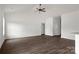 Spacious living area with vaulted ceiling and hardwood floors at 143 Tranquility Ln, Harmony, NC 28634