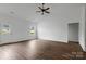 A spacious living room featuring hardwood floors and lots of natural light at 143 Tranquility Ln, Harmony, NC 28634