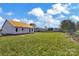 Spacious lot with a new construction home ready to be finished to your liking, offering ample space at 143 Tranquility Ln, Harmony, NC 28634