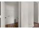Walk-in closet featuring a wire shelving system and wood-look flooring at 149 Tranquility Ln, Harmony, NC 28634