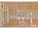 Unfinished interior showcasing the framing and layout of a new home construction at 149 Tranquility Ln, Harmony, NC 28634