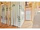Unfinished interior showing wooden frame construction with insulation and exposed plywood subflooring at 149 Tranquility Ln, Harmony, NC 28634