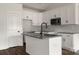 Bright kitchen with granite countertops, modern cabinets, and stainless-steel appliances at 149 Tranquility Ln, Harmony, NC 28634