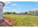 Large grassy area showcasing the new home building site within the community at 149 Tranquility Ln, Harmony, NC 28634
