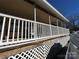 White deck railing with lattice at 168 Clubhouse Dr, New London, NC 28127