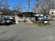 Park model home with deck and lake access at 168 Clubhouse Dr, New London, NC 28127
