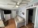 Living room with a sofa, TV, and lake-themed decor at 168 Clubhouse Dr, New London, NC 28127