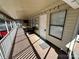 Covered porch with patio furniture and a view of the surrounding area at 168 Clubhouse Dr, New London, NC 28127
