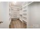 Large walk-in closet with ample shelving and hanging space at 1719 Kelley Lake Dr, York, SC 29745