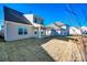 View of the backyard and covered patio at 18011 Wilbanks Rd, Charlotte, NC 28278