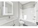 Clean bathroom, bathtub, shower, and modern vanity at 1927 W Trade St, Charlotte, NC 28216