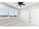 Spacious bedroom with ceiling fan and city view at 1927 W Trade St, Charlotte, NC 28216